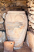 The palace of Festos. The storeroom of the old palace, 'pthoi' giant jar still in place.